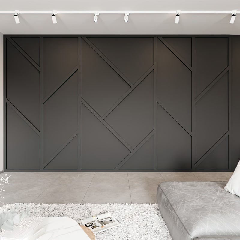 Antrasit duvarda P851350 poliüretan duvar çıtası ile oluşturulmuş geometrik modern panel kaplama tasarımı.