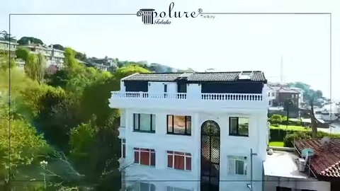 Köşkün tamamlanmış cephesi bahçe içinden genel görünümde